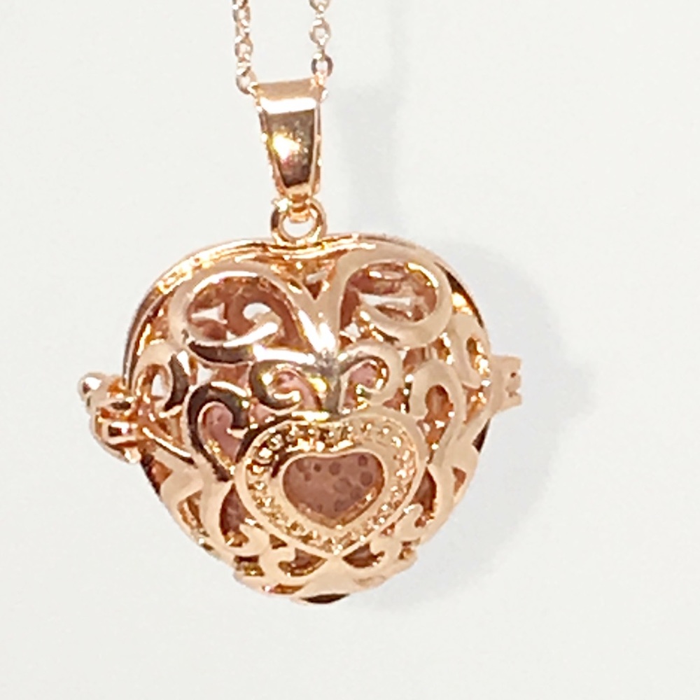 Open rose gold heart essential oil locket 18 inches in length lobster class
